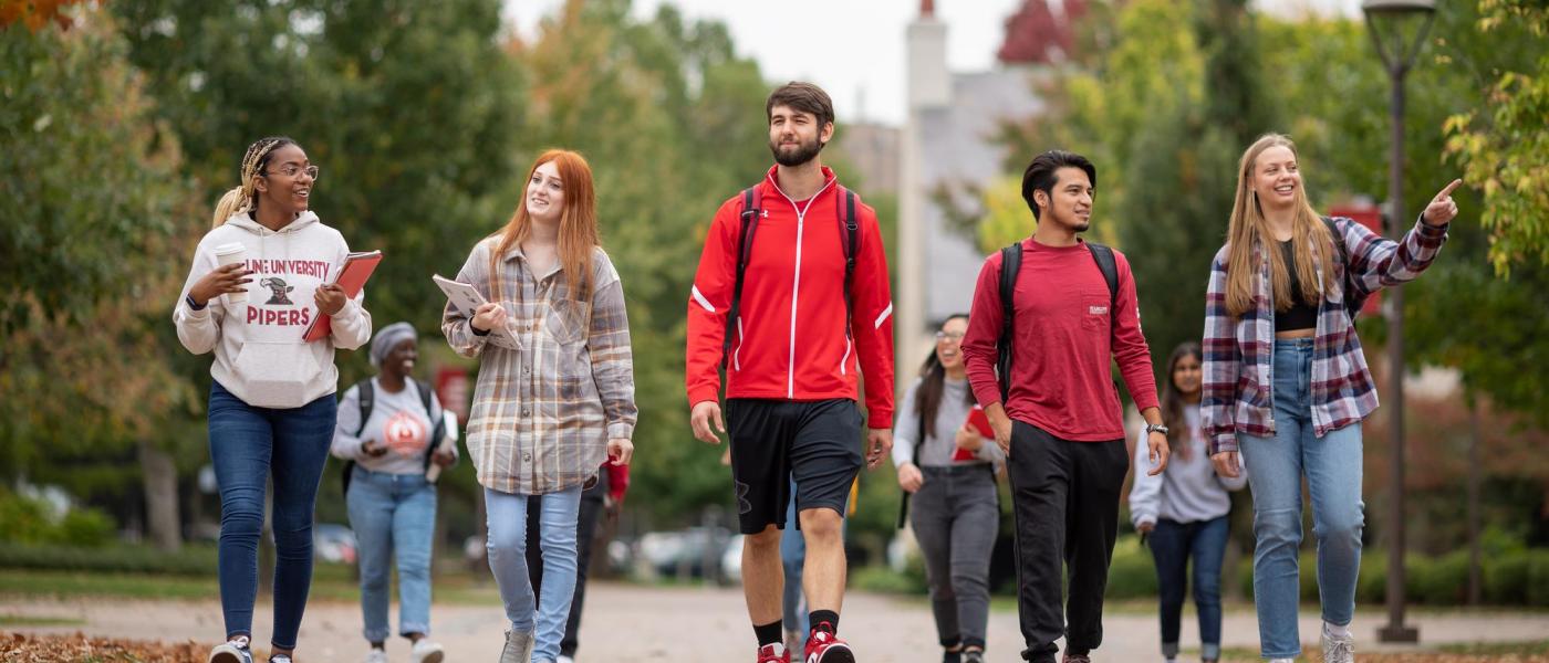 Students walking in front of Old Main