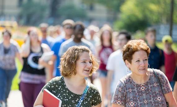 A photo of first-year students visiting campus with their parents 