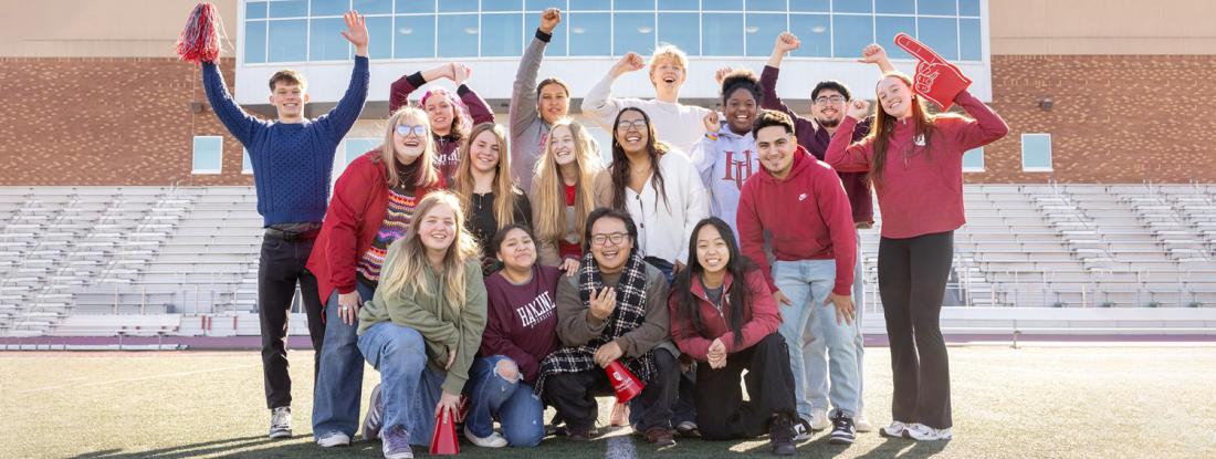 Hamline students cheering on field