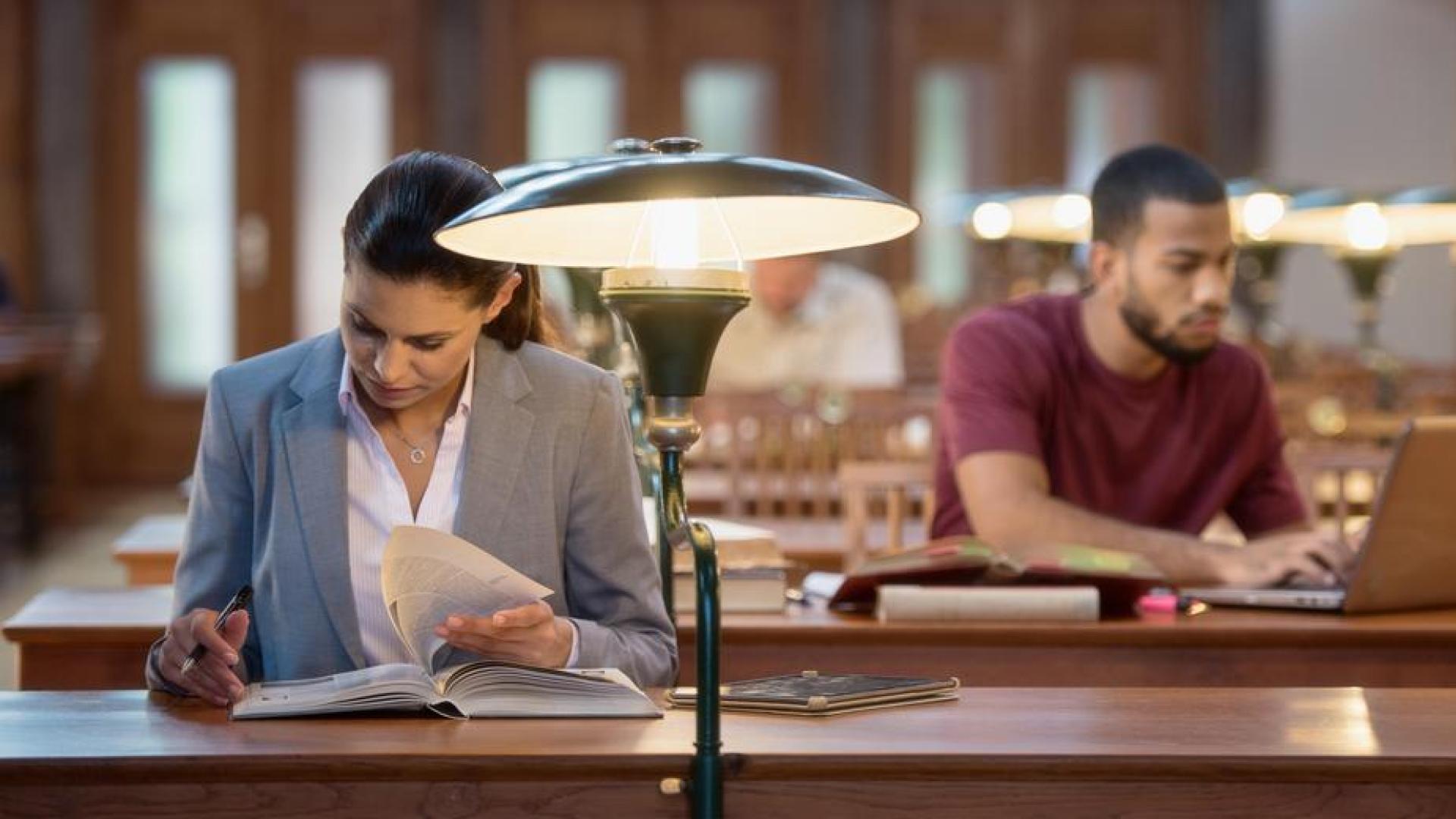 Law student studying in library