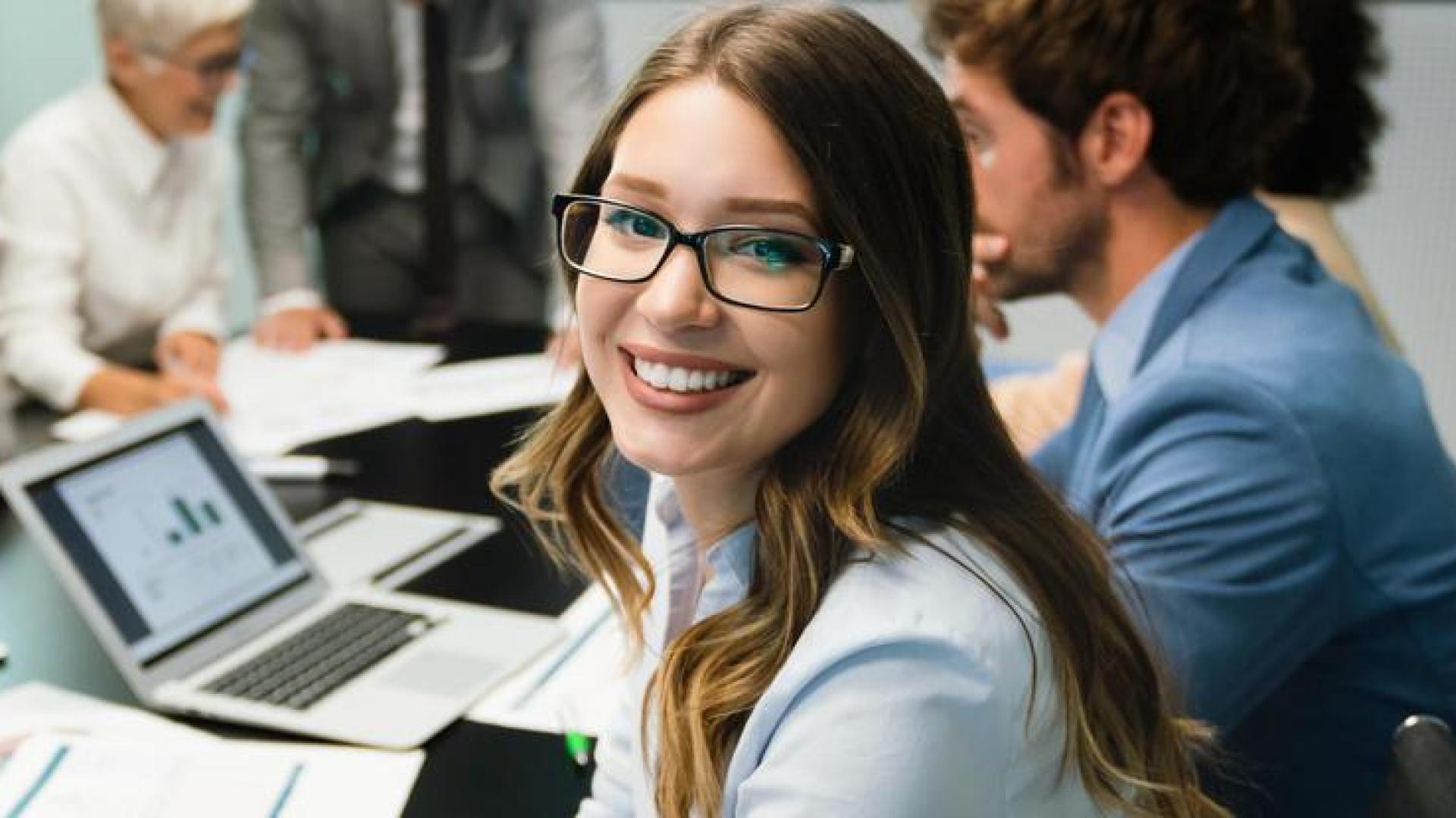 Photo of young business professionals working together