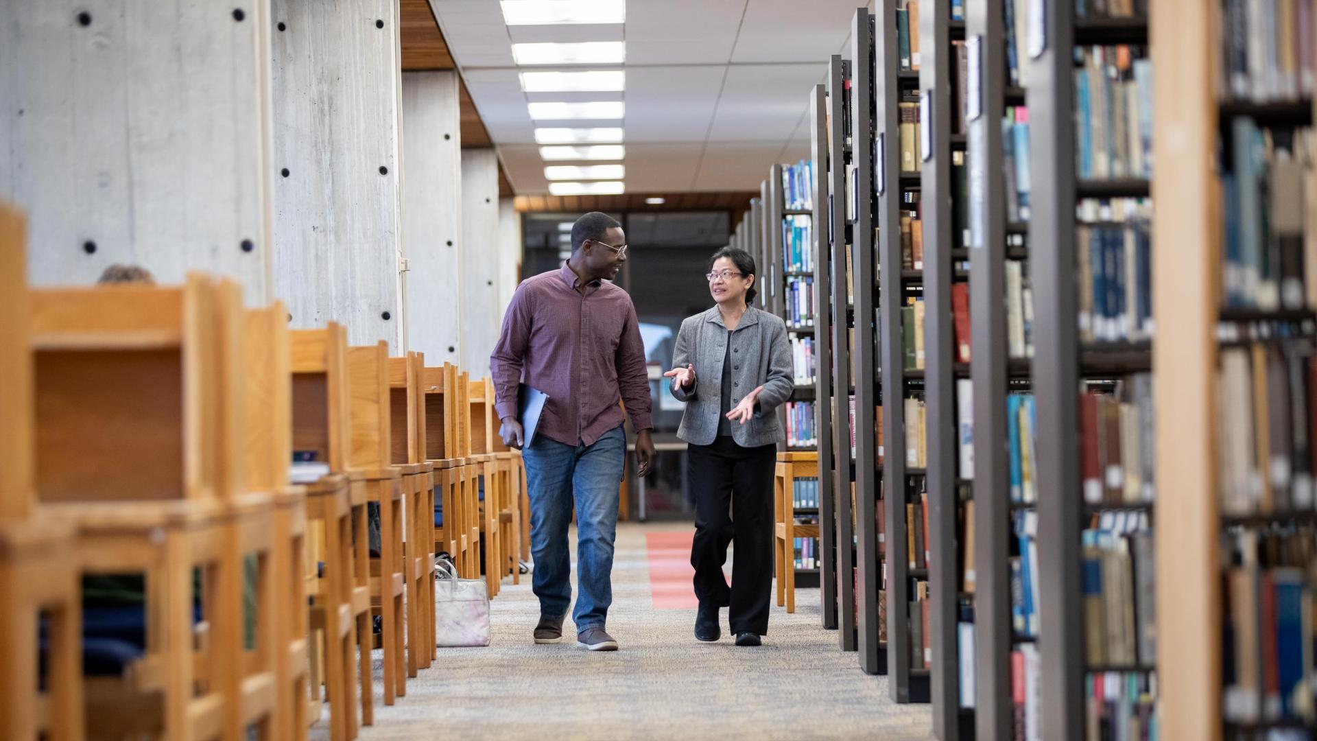 English and Communications Studies student and professor in library