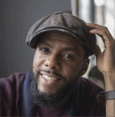 Joe Davis, poet and speaker at the Hedgman Center's 2025 Social Justice Symposium at Hamline University